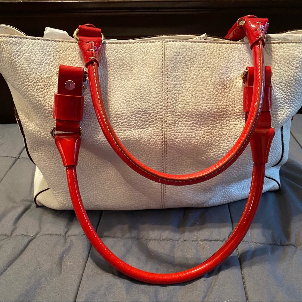 Kate spade off white and red medium size purse . Lightly used !